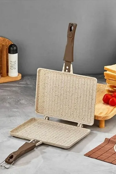 İnci Döküm Ocak Üstü El Tost Makinesi - Krem İnci Döküm Ocak Üstü El Tost Makinesi - Krem